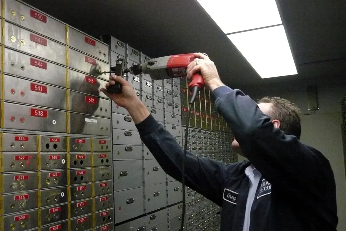 Licensed locksmith technician at a Cypress home front door with keys